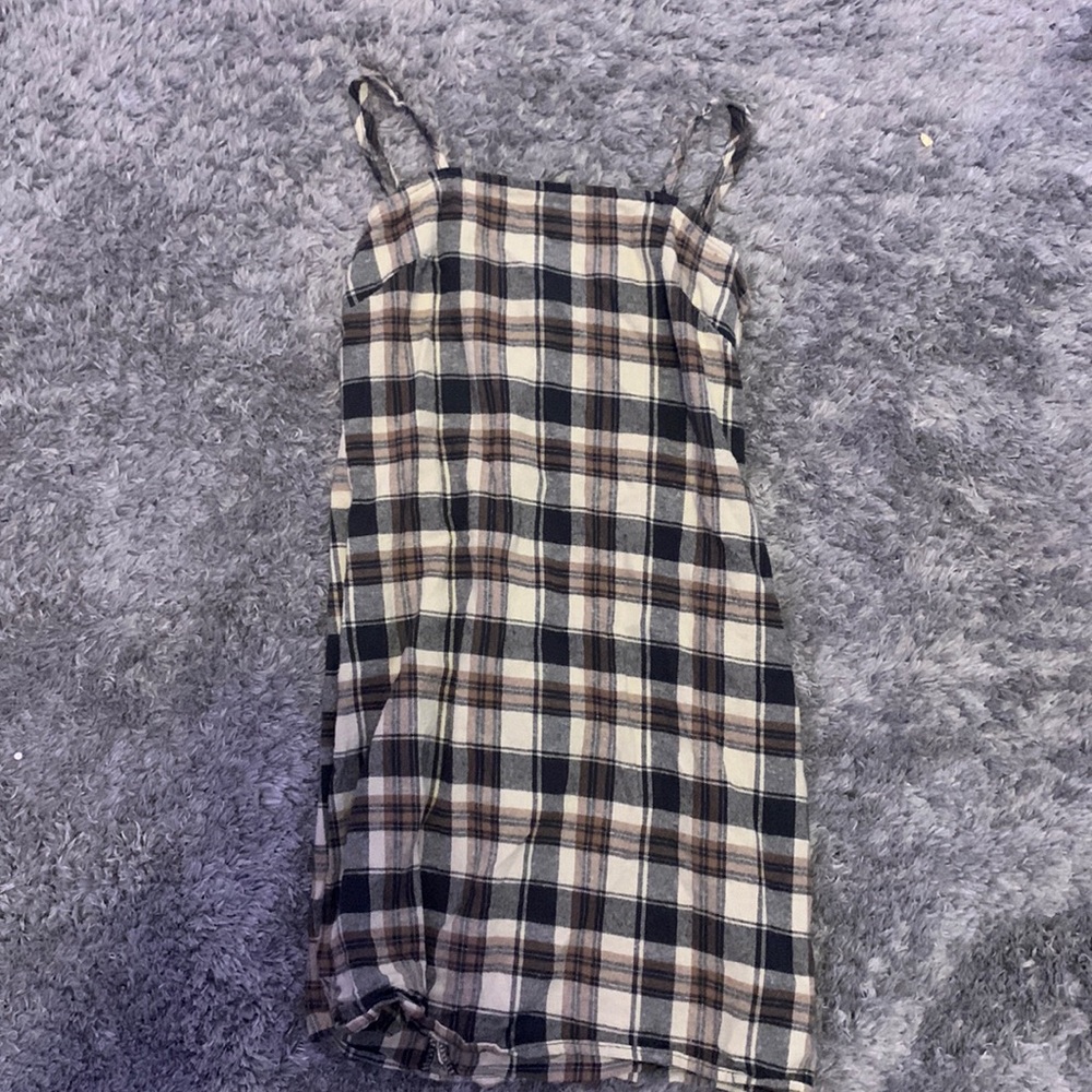 Pattern dress cute to go over a turtle neck or any shirt ! Knee length